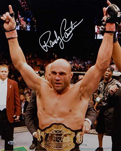 Randy Couture Autographed UFC 16x20 With Belt Photo- Beckett Auth White - Image 2