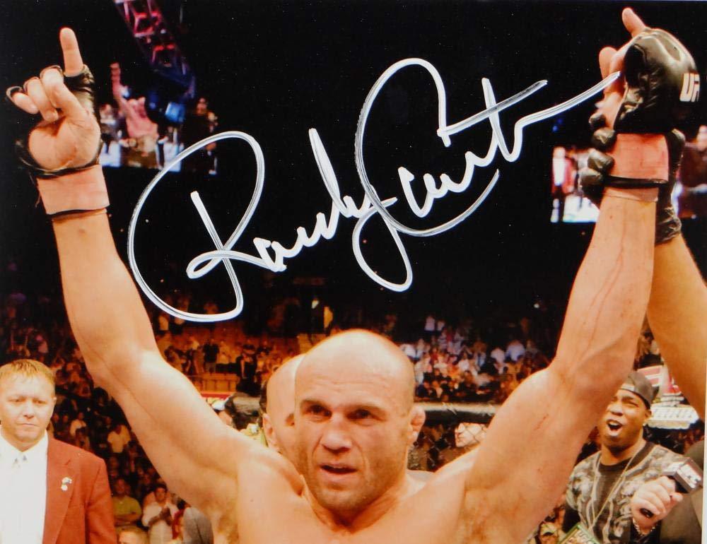 Randy Couture Autographed UFC 8x10 Photo With Belt- Beckett Auth White