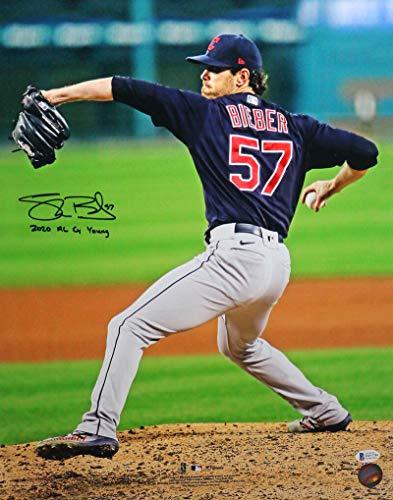 Shane Bieber Autographed Cleveland Indians 16X20 FP Pitching w/Insc - Beckett W Auth Black